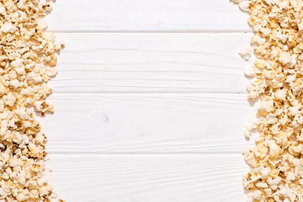 Full Frame Arranged Popcorn White Wooden Tabletop — стоковое фото